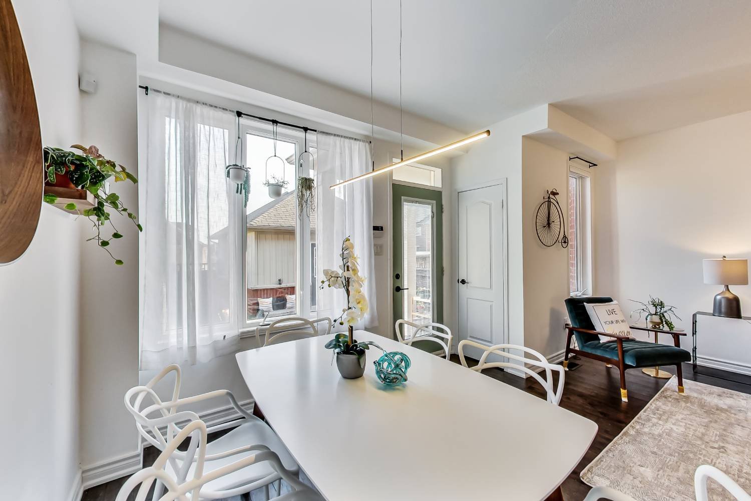A bright, light-filled living and dining space in a Toronto home the team has sold